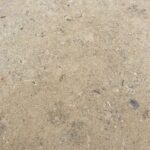 Hamlet tumbled and brushed limestone